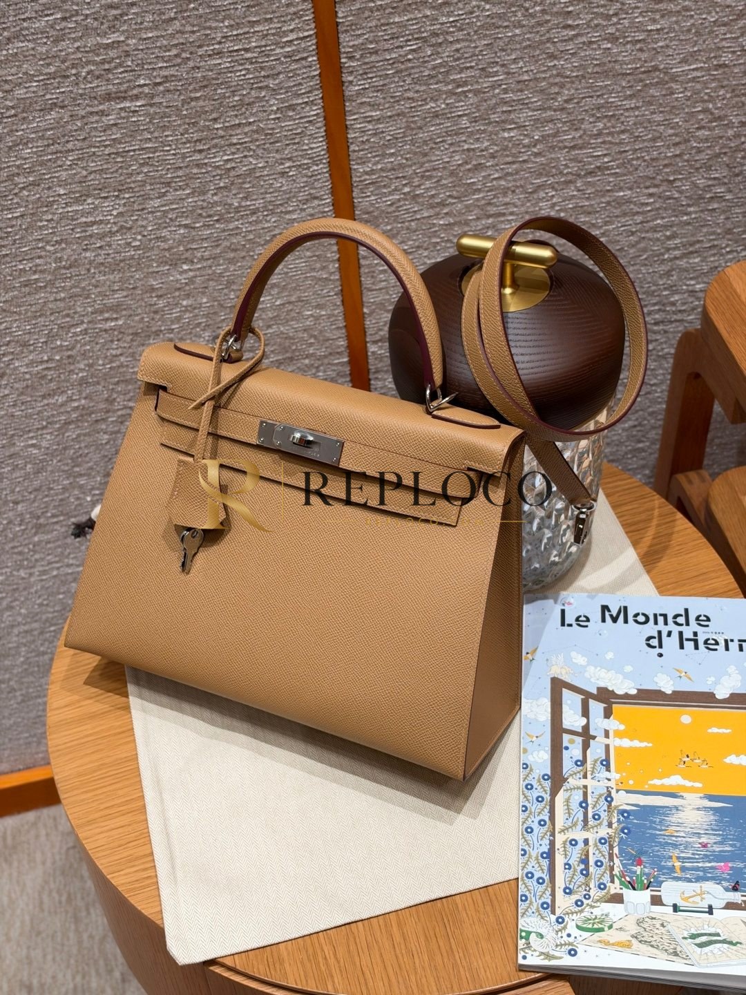 All handcrafted Hermes Kelly 28 Biscuit Absong leather palladium hardware